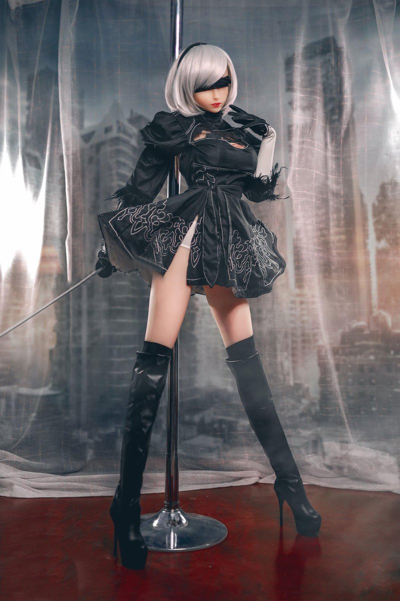 2B gaming sex doll lifting the dress skirt, thigh visible, city backdrop