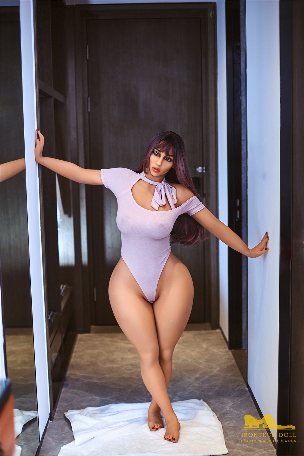 Everly, a 156 cm BBW TPE sex doll in a doorway