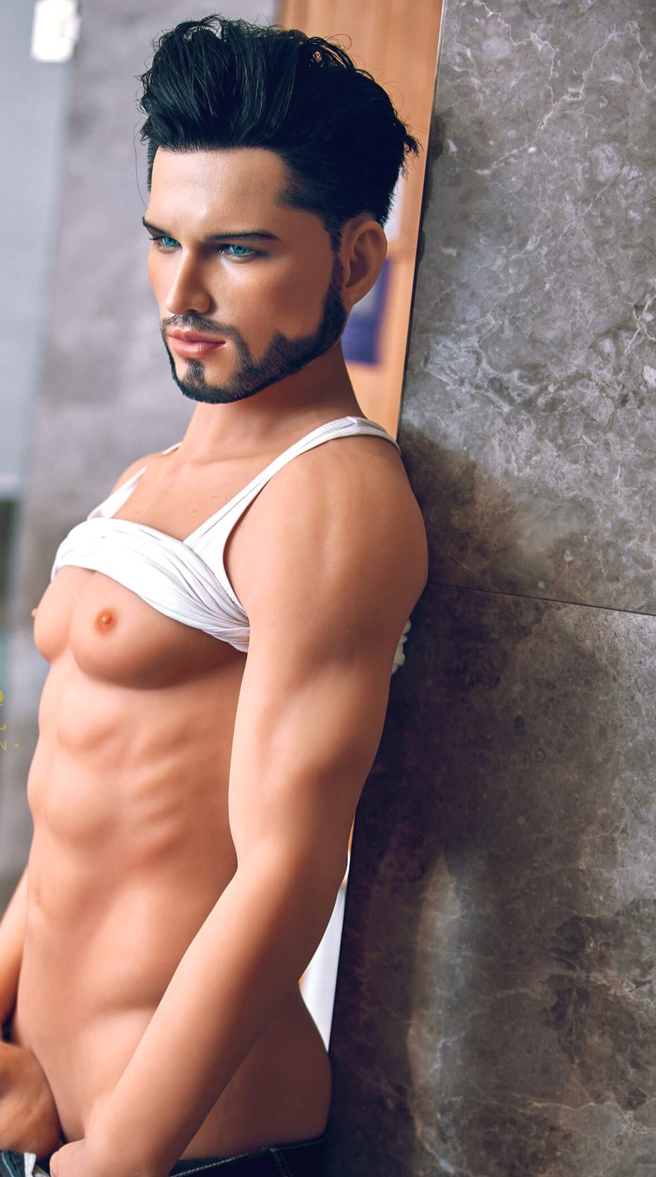 Liam, a 162 cm male doll lifting his tank to show cast abdominal lines