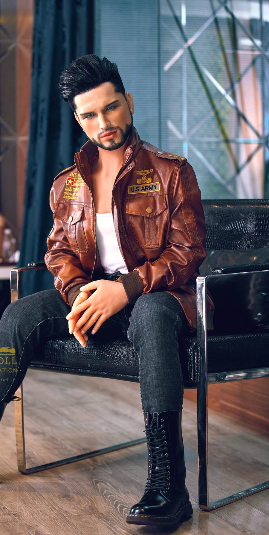 Liam, a 162 cm male sex doll seated in a brown leather jacket and boots